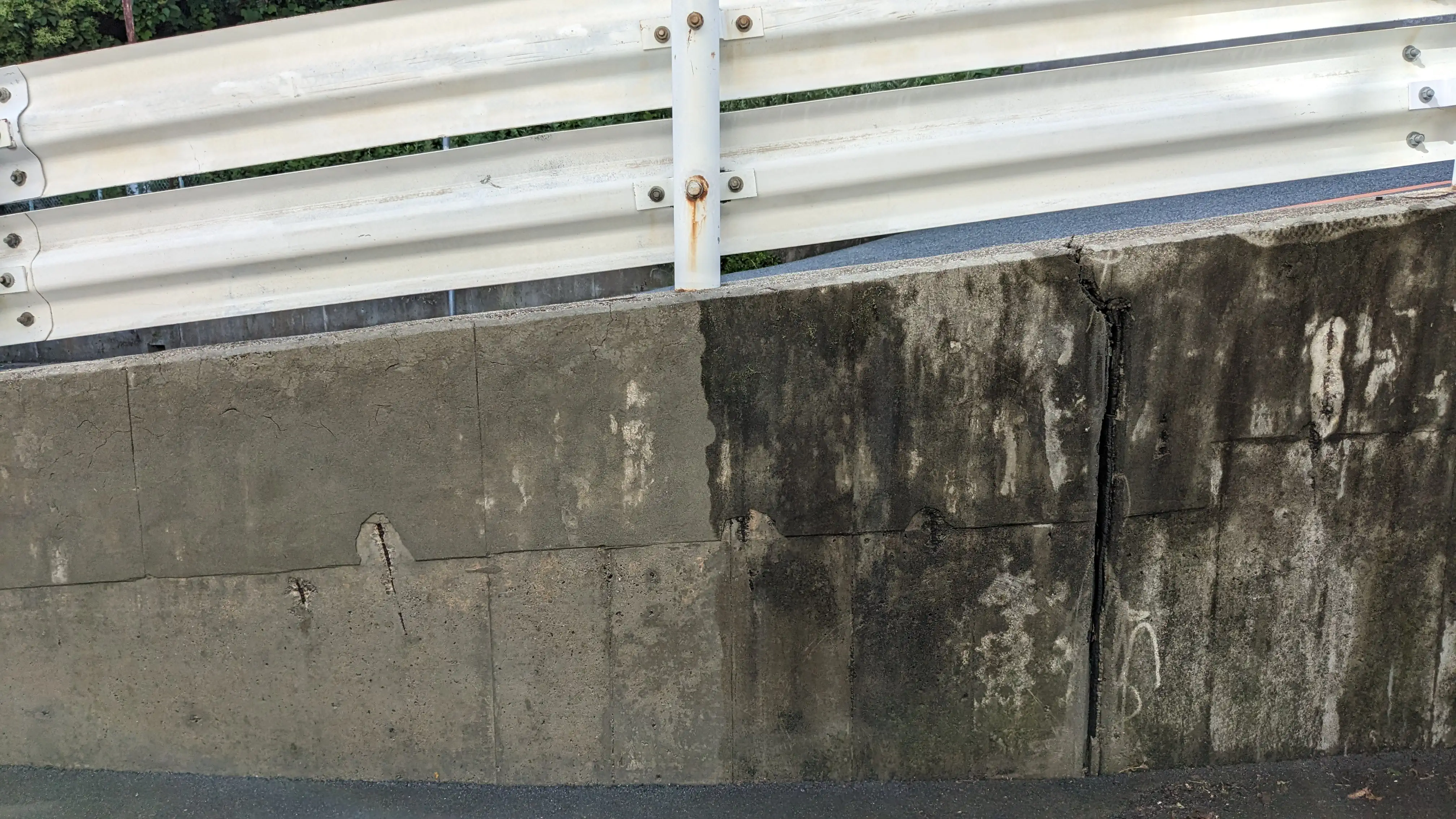 Concrete wall and ramp pressure washing after drying